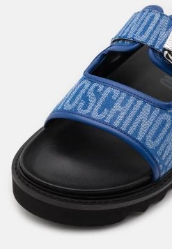 MOSCHINO Mule - Sandalias Planas - Blue 13 MOSCHINO Mule - Sandalias Planas - Blue -Zapato Tienda 1ef6009132354d1ea79dcb09b306e9b7